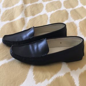 Tod’s black leather driving shoes